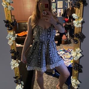 Never worn romper with lace fringe!